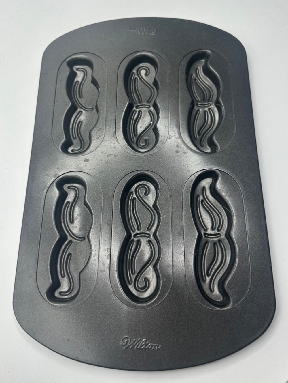 Wilton's Mustache Cake Pan Baking Kitchen.